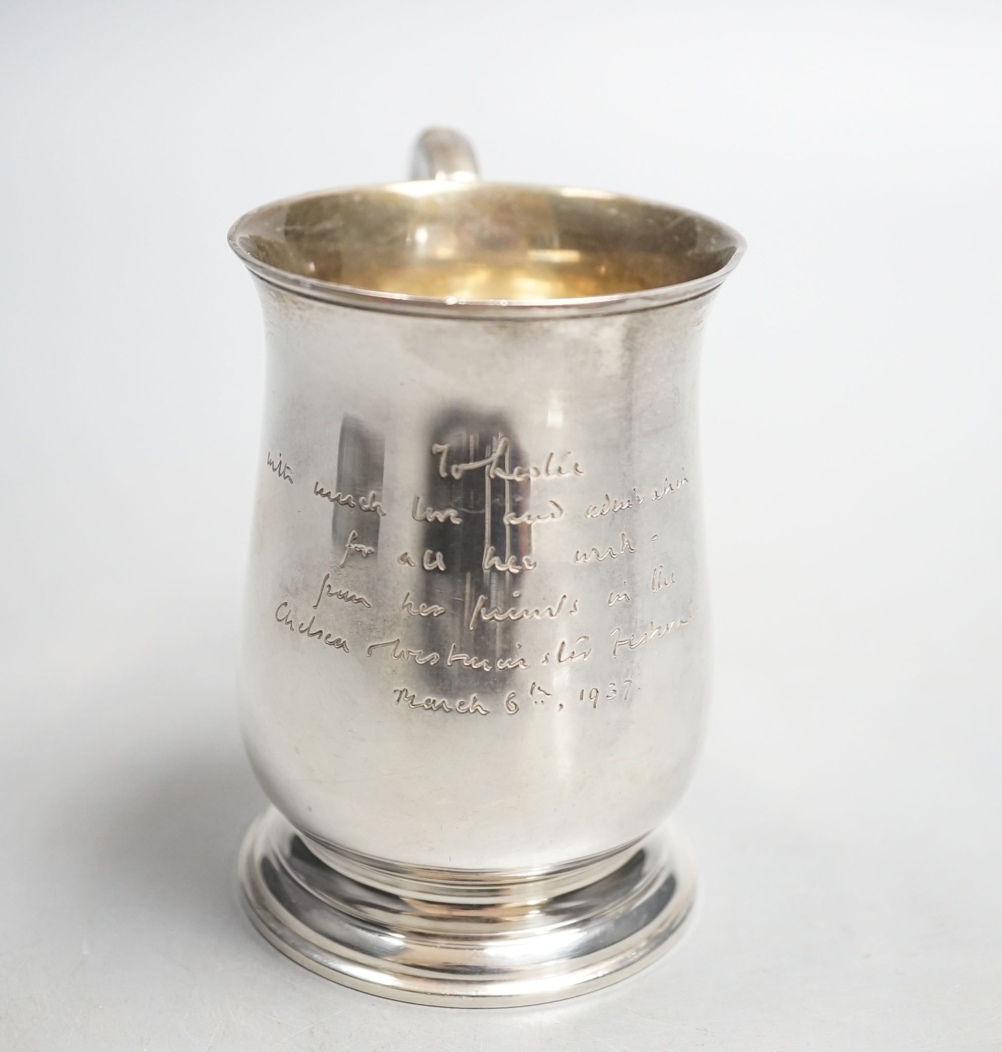 A Victorian silver christening mug, London, 1936, with engraved inscription, 89mm, 141 grams.